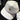 White cap with a colorful strap and logo on a car seat